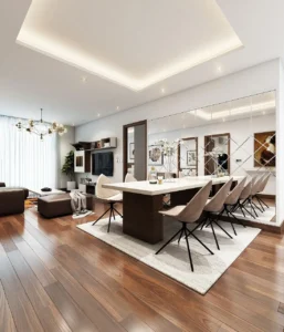 Instalación de suelo laminado de alta gama en salón residencial de Valencia con acabado en madera natural y nivelación de precisión.